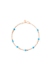 Bracciale Mini Granelli DoDo in oro rosa 9K e ceramica turchese, design naturale ispirato alla sabbia levigata dal mare.